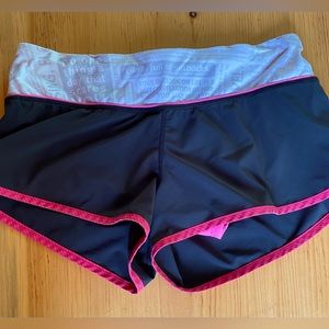 Women’s Lulu Lemon running shorts with motto on waist band. Size 6.